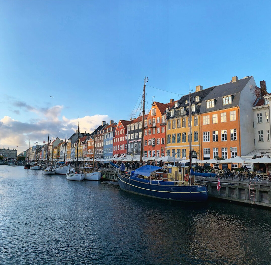 Colorful harbor houses at Nyhavn in Copenhagen at sunset