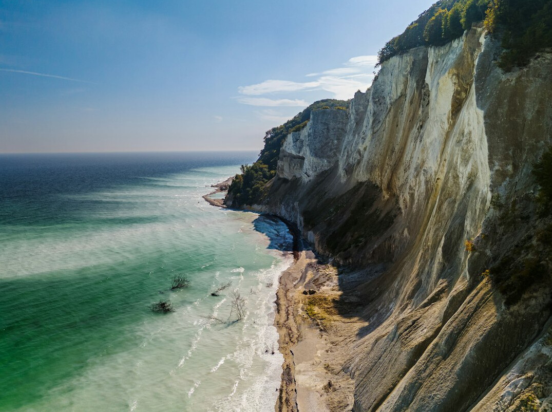 Scenic white cliffs and coastline of Denmark on a clear day